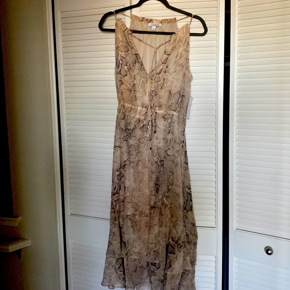 Beautiful dress with open cut front that ties.